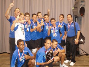 BYU volleyball player Josue Rivera, back row, second to left, celebrates a victory with his former team in San Juan, Puerto Rico. Photo courtesy Josue Rivera