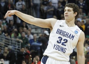 BYU guard Jimmer Fredette (32) reacts after scoring against Wofford during the second half of a Southeast regional second round NCAA tournament college basketball game, Thursday, March 17, 2011, in Denver. Fredette score 32 points, leading BYU to a 74-66 win. (AP Photo/Ed Andrieski)