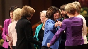 Female auxiliary leaders of the Church greet one another after a worldwide broadcast.  Photo Courtesy of: Mormon Newsroom