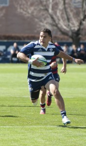 A Cougar rugby player sprints down the field looking for an open team mate during the BYU vs. St. Mary's game on March 8, 2014. Photo by Natalie Stoker