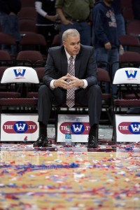 Head coach Dave Rose takes a seat after Tuesday's WCC Championship game loss to Gonzaga. Photo by Elliott Miller