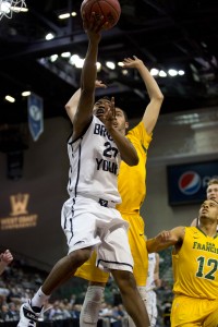 Anson Winder jumps for a lay up in Monday's WCC Semifinal game against San Francisco. Photo by Elliott Miller.