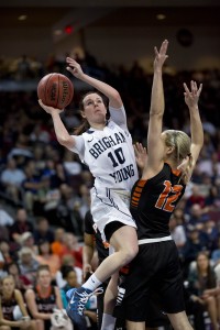 Stephanie Rovetti makes a lay up against Pacific defender Erin Butler in the WCC Semifinal game. Photo by Elliott Miller.