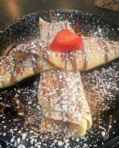 The summer fling is one of Roll Up's most popular dishes. The dessert crepe is made with Nutella and fresh strawberries. (Photo courtesy of Madi Nield.)