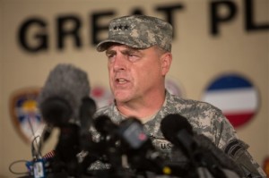 Lt. Gen. Mark Milley, the senior officer on base, speaks with the media outside of an entrance to the Fort Hood military base following a shooting that occurred inside, Wednesday, April 2, 2014, in Fort Hood, Texas. (AP Photo)
