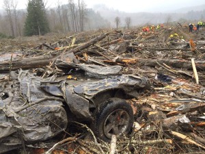 Remains of car left in the  trail of destruction of a mudslide which took more than 27 lives on March 22 in Oso, Wash. (Courtesy of Jordan Grimmer)