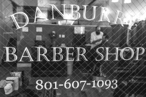 Looking through the door of Danburry Barber Shop.