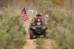 Ryan Bundy, son of the Nevada rancher Cliven Bundy, rides an ATV into Recapture Canyon north of Blanding, Utah on Saturday, May 10  in a protest against what demonstrators call the federal government's overreaching control of public lands. Photo by Associated Press.