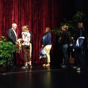 Brother Russell T. Osguthorpe shakes hands after his remarks on Thursday's Women's Conference.