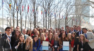 BYU students hold up their 'outstanding delegation awards' at the National Model United Nations in New York City.