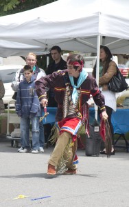 A man called "Morning Star" dances in native clothing as part of a performance at the Museum of Peoples and Cultures Block Party, Sat., May 10, 2014. (Photo by Natalie Stoker.)