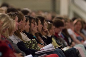 A BYU Women's Conference audience listens to Matt and Mardi Townsend.