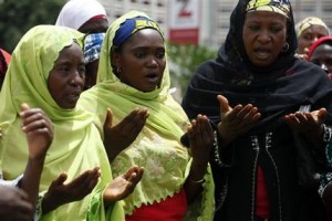 Muslim women pray at a meeting calling on the government to rescue the kidnapped girls of the government secondary school in Chibok, in Abuja, Nigeria, Tuesday, May 27, 2014. Apparent disagreement has emerged between Nigeria’s military chiefs and the president over how to rescue nearly 300 schoolgirls abducted by Islamic extremists, with the military saying use of force could get the hostages killed and the president reportedly ruling out demands for a prisoner exchange. (AP Photo/Sunday Alamba)