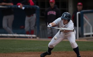 BYU outfielder Brennen Lund attempts to lay down a bunt against Utah May 6. Photo by Ari Davis