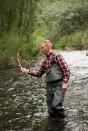 1. Frank Young casts a fly into a nearby eddy with his  tenkara rod 2. Frank Young casts a fly on the Provo River with his tenkara rod Photo Credit. Caleb Beazel
