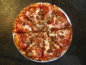 Pier 49 offers great selection and great quality, and it doesn't skimp out on toppings, as can be seen here with their "Cable Car" pizza.  It has sausage, pepperoni, ham, hamburger and bacon. (Jeffrey Allen)