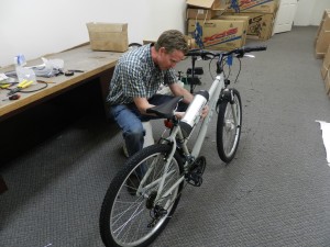 When engineering professor, Myles Christensen  isn't teaching or spending time with family at home, he can be found hard at work at his brand new shop, JiggaWatt Cycles, which specialized is electric bicycles. (Jeffrey Allen)
