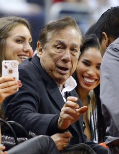 In this Oct. 25, 2013 file photo, Los Angeles Clippers owner Donald Sterling gestures as the Clippers play the Sacramento Kings during the first half of an NBA basketball game in Los Angeles. The future of the Clippers is closer to decision as testimony resumes Monday, July 21, 2014,  in a probate trial over whether a deal negotiated by Donald Sterling's estranged wife to sell the team for $2 billion is authorized under a Sterling family trust. (AP Photo/Mark J. Terrill)