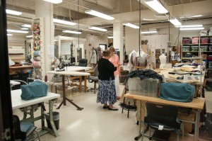 Helen Alexander, known as "Bunnie", meets with Mary Jane Wadley, a costume maker for the theatre program. The costume shop is just one of the many areas in the HFAC that Bunnie helps maintain as the custodial supervisor in the Harris Fine Arts Center. (Natalie Stoker)