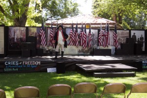 Scott Swain on stage for "Cries of Freedom" to play for Fourth of July Weekend. (Ari Davis)