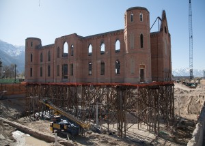 The exterior walls of the old tabernacle were put on stilts in April 2013 as the underground levels of the temple and surrounding parking garage were being constructed. (Elliott Miller)