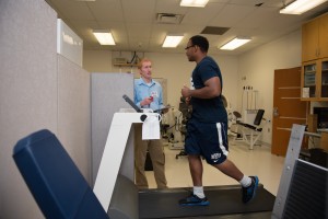 Health coach Travis Masterson tests Akim Pittman's cardiovascular ability while performing fitness testing. The Y Be Fit coaches often run into exercise and nutrition myths when testing and consulting patients. Photo credit: Caleb Beazel