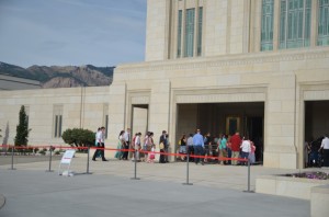 People lining up to get into the temple. 