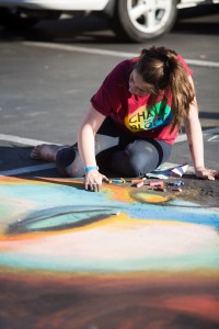 Artists of all ages came to contribute their talent to Chalk the Block at the Riverwoods. (Bryan Pearson)