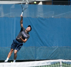 Juan Canales serves the ball. (Universe Photo)