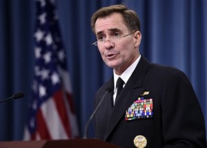 Pentagon press secretary Navy Rear Adm. John Kirby speaks during a briefing at the Pentagon. The Pentagon on Monday night, Sept. 22, says the U.S. and partner nations have begun airstrikes in Syria against Islamic State militants, using a mix of fighter jets, bombers and Tomahawk missiles fired from ships in the region.