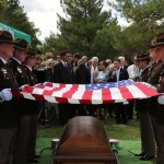 A Utah Highway Patrol Honor Guard pays tribute to Dennis J. Nordfelt at the grave site. Photo courtesy of Kevin Conde