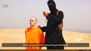 An unidentifed ISIS militant warns President Barack Obama that continued military action will result in military action before he beheads journalist James Foley. ISIS uses beheadings to incite fear. (Reuters)