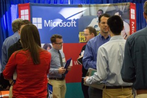 Companies like Microsoft come to BYU to answer students' questions about working for a large company and give them information on entry level jobs available after graduation. (Samantha Williams)