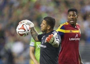 Real Salt Lake goalkeeper Nick Rimando, left, reacts to red card issued to teammate Nat Borchers in a recent Real Salt Lake game. (AP Photo/Stephen Brashear)