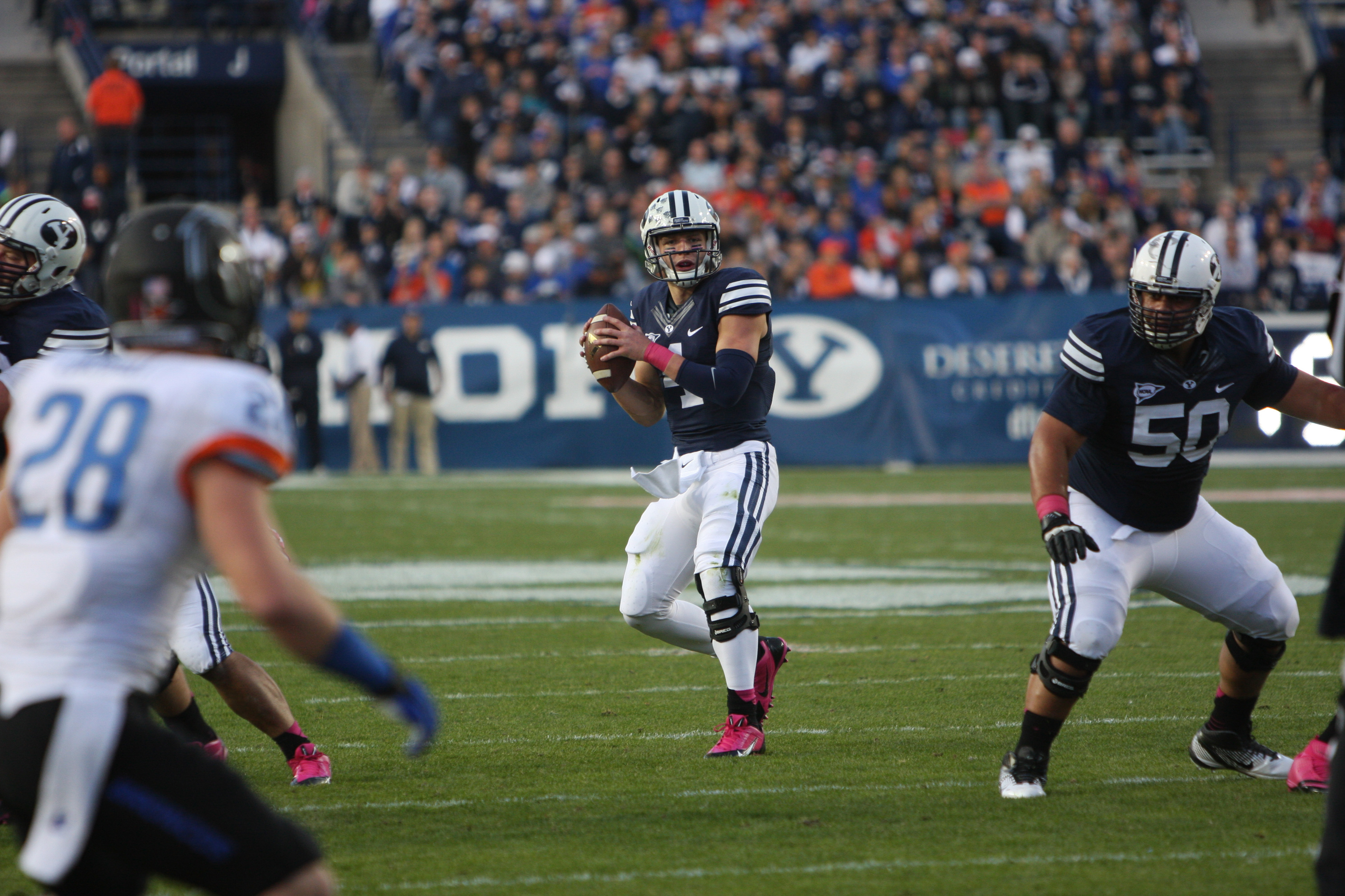 Taysom Hill looks down field for an open receiver against Boise State last season. The Cougars will travel to Boise to face the Broncos on Oct. 24. (Natalie Stoker)