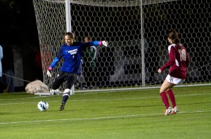 Former BYU Goalkeeper Erica Owens returns the ball to her teammates during a soccer match last season. (Universe photo)