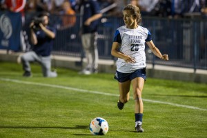 Niki Fernandes takes the ball down field towards the goal in the game against Colorando College (BYU Photo)