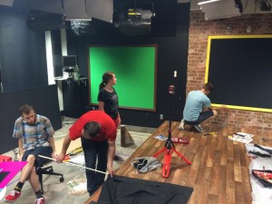 Students work to build the set of "The Fantastically Late Show"