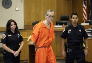 Martin MacNeill enters the courtroom before his sentencing, Friday, Sept. 19, 2014, in Provo, Utah. MacNeill, a Utah doctor convicted of killing his wife in a trial that became a national true-crime cable TV obsession, has been sentenced to 17 years to life in prison. MacNeill was found guilty of giving his wife drugs prescribed after cosmetic surgery and leaving her to drown in the bathtub of their home in 2007 so he could begin a new life with his mistress. (AP Photo/Rick Bowmer)