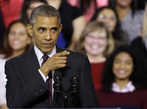 Four days before midterm elections in which Obama's fellow Democrats need a big turnout from female voters, Obama spoke in Rhode Island on growth in the U.S. economy and administration policies directed at women. (AP Photo/Stephan Savoia)