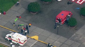This image made from a video provided by KOMO shows emergency personnel responding after reports of a shooting at Marysville-Pilchuck High School in Marysville, Wash., Friday, Oct. 24, 2014. (AP Photo/KOMONews.com) 