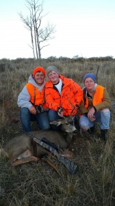Adam Peterson, left, poses with brothers after harvesting a 3x2 buck in Utah. The deer rifle season started on Oct. 18.
