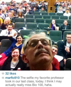 Professor Riley Nelson snaps a selfie while teaching his Biology 100 course. (Mariel Flores)