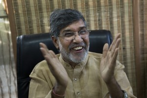 Indian children's rights activist Kailash Satyarthi gestures as he addresses the media at his office in New Delhi, India, Friday, Oct. 10, 2014. Malala Yousafzai of Pakistan and Satyarthi of India jointly won the Nobel Peace Prize on Friday, Oct. 10, 2014, for risking their lives to fight for children's rights. (AP Photo/Bernat Armangue)