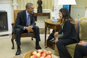 President Barack Obama meets with Ebola survivor Nina Pham in the Oval Office of the White House in Washington, Friday, Oct. 24, 2014.  Pham, the first nurse diagnosed with Ebola after treating an infected man at a Dallas hospital, was recently pronounced free of the virus and released from the hospital. (AP Photo/Evan Vucci)