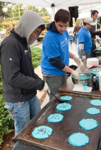BYUSA members prepare blue pancakes for a homecoming breakfast. (Chris Bunker)