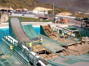 In this photo taken on Wednesday, Oct. 8, 2104, the ramps at the Utah Olympic Park aerials training facility in Park City, Utah, being removed after serving athletes for 22 seasons. New jumps are expected to open for training in summer 2015. The project will cost $3 million. (AP Photo/The Deseret News, Steve Landeen)  SALT LAKE TRIBUNE OUT;  MAGS OUT