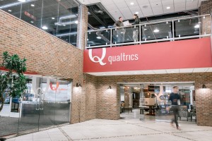 Employees come and go from the Qualtrics headquarters at Provo's Riverwoods Business Park. The company went from a small business in a basement to a billion-dollar corporation in just a few years. (Qualtrics)
