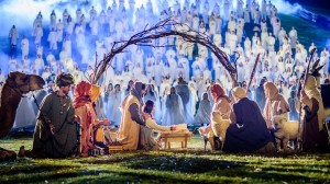Volunteers, YouTube personalities and musicians gather in Rock Canyon Park in Provo Monday night to break a Guinness World Record for largest live Nativity scene. Footage from the scene will also be used in the Mormon Church's #ShareTheGift campaign. (Live Nativity World Record Facebook page/Scott Jarvie)