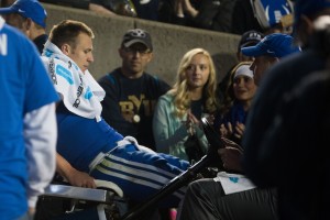 Fans watch when Taysom Hill was carted off the field vs. Utah State. (Universe Photo)